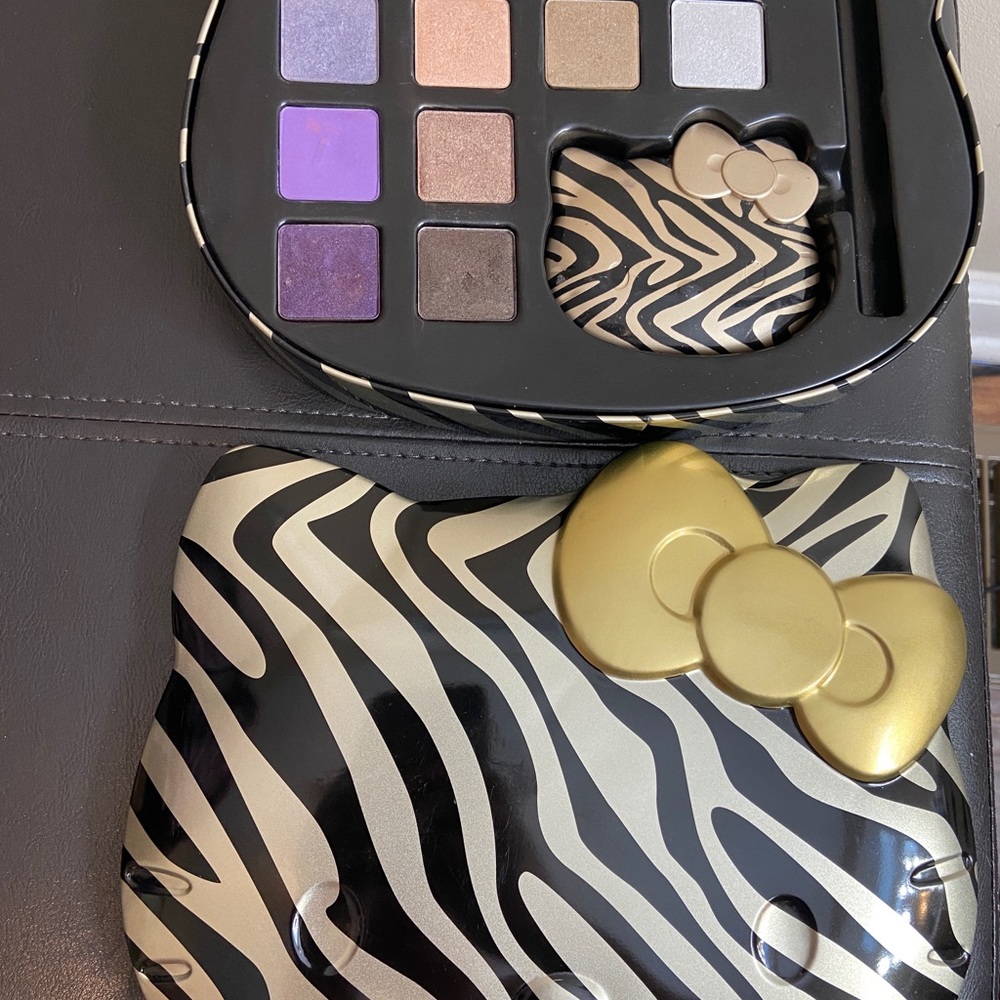 Lightly used Hello Kitty makeup pallet w/ mirror